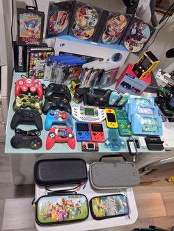 Selling All these games , controllers,  and more items,  everything for 160. Everything in Good condition. 

11 small electronic games...

-red Vintag