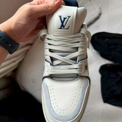 Louis Vuitton trainer sports shoes in black and white color scheme