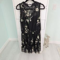 New Woman's Flowy Dress Size XL Black With Cream And Yellow Flowers Has Under Dress With Spaghetti Straps