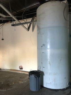 4 large water tanks 2 that hold 2000 gal and 1 that holds 1000 gal and three 125 gal