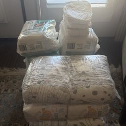 12 Packages Of Newborn Diapers!