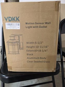 Brand New Never Opened Outdoor Sensor Light With Outlets