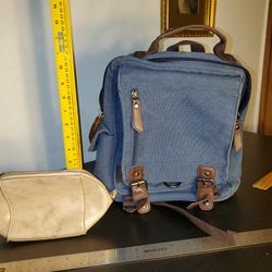 2 Bags:Blue Canvas Backpack with Leather Accents 9"*3 3/4"*12"H + H&M Make-up Bag 4.5"*2.5"*4.5"H In Great Condition 
net weight 1 lb 14.2oz

Stylish 