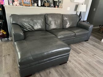 Gray leather couch with chaise