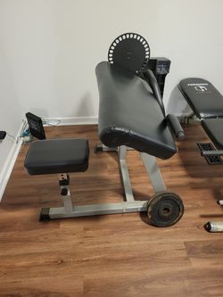 Seated curl machine