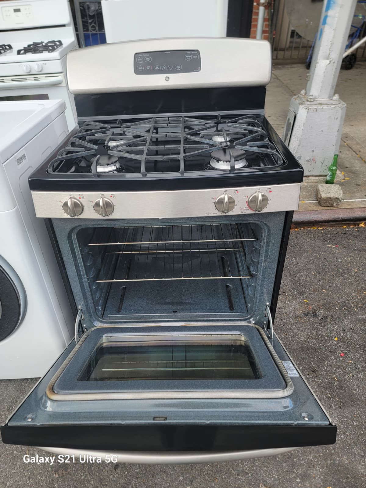General electric stove available installation and new gas hose