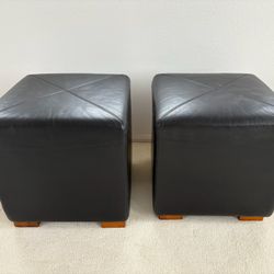 Pair Of Black Leather Ottomans