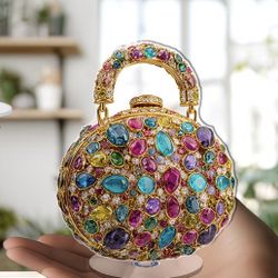 2D Flat - A Two-Dimensional Rotating Acrylic Table Decoration Showcasing a Decorative Handbag Embellished with Vibrant Jewels And Diamonds, Ideal for 