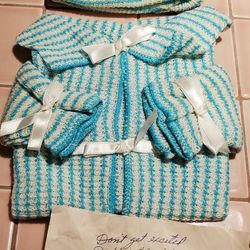 Baby Shower Gift. Hat And Jacjet Made Of Dish Cloths. And 4 Baby Hangers