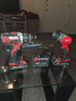 Milwaukee Drill and Light Set. 3 Batteries Included