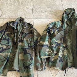 Pair of military field jackets Large Sizes near mint minty new M65 and hooded rain coats