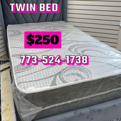 Twin size frame headboard with mattress for $250 only whole bed in picture available for pick up or delivery