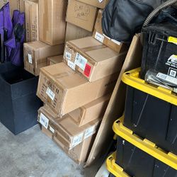 Lighting fixtures. 15 Boxes Of Vanity Lights And Chandeliers. Moving sale