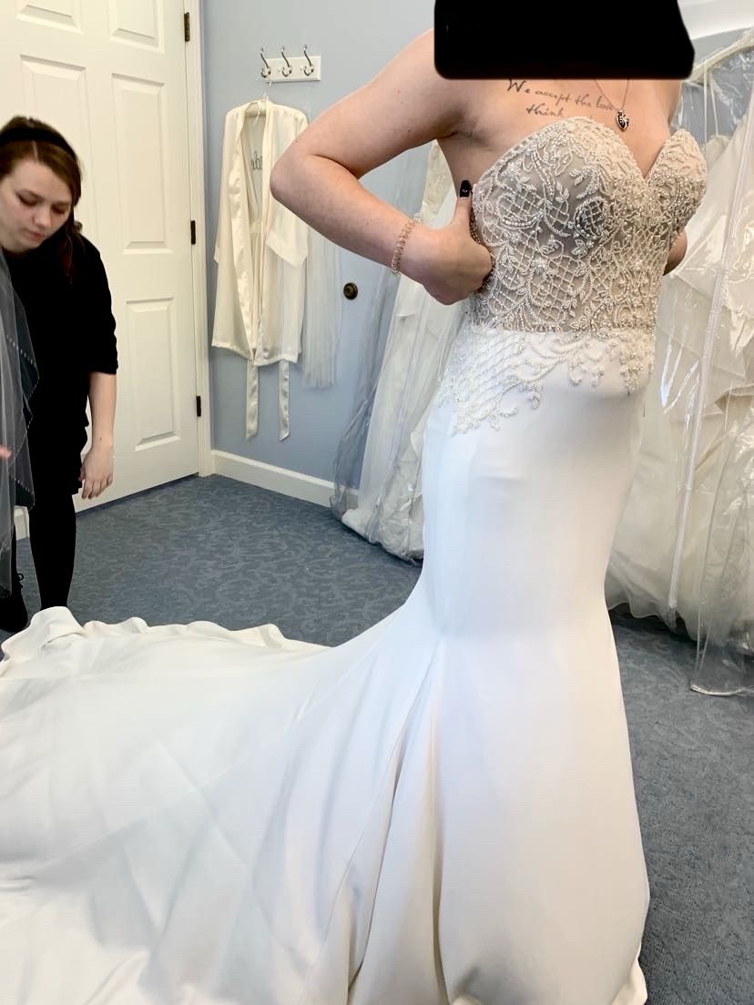 Justin Alexander nude and ivory mermaid wedding dress and cathedral veil