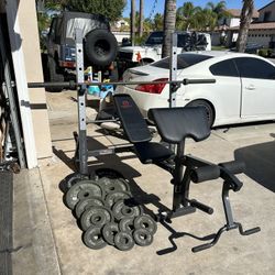 Bench press/squat rack with 7ft 45lbs bar plus 265lbs of Olympic weights