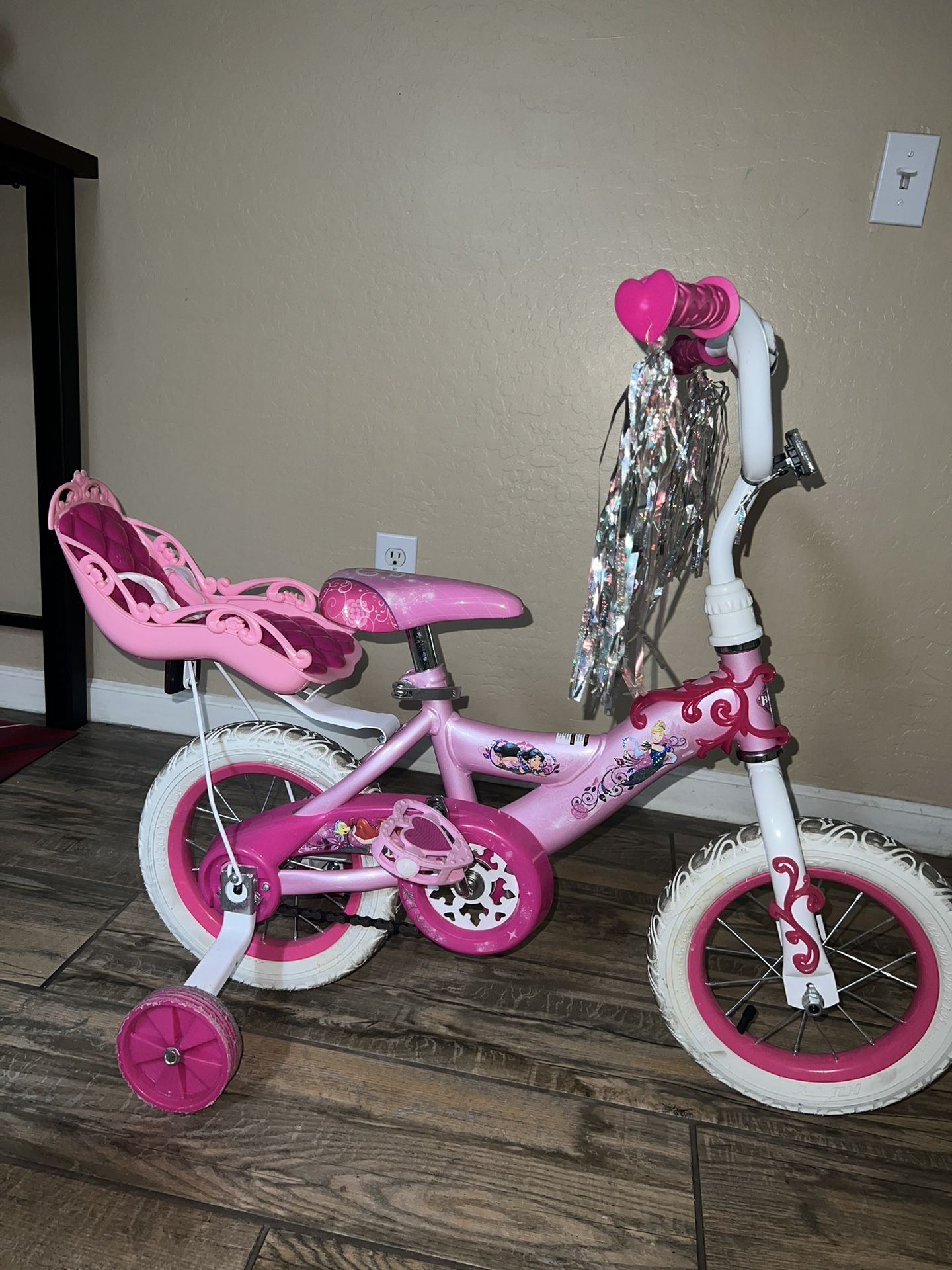 Huffy princess bike with doll carrier hotsell