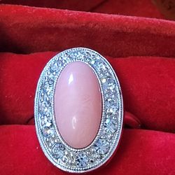 Vintage 1973 Avon Pale Fire Ring  with faux Pink Coral Color and Rhinestone. Adjustable ring fits sz 5 - sz 6
