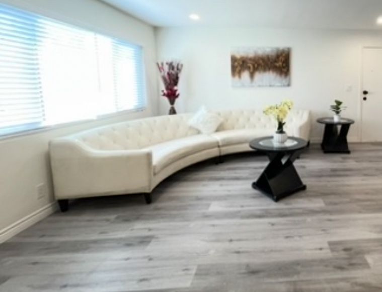 White Curve Sofa & 2 Round End Tables