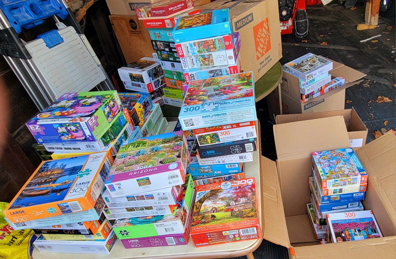 Boxes full of NICE 300 and 500 pc. Puzzles $5. each