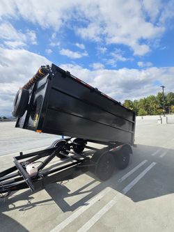 NEW DUMP TRAILER 12X8X4 HYDRAULIC SYSTEM,ROLLING TARP,SPARE TIRE,REMOTE CONTROL,EMERGENCY BRAKES TITLE IN HAND READY FOR WORK FOR SOME QUESTION TEXT M