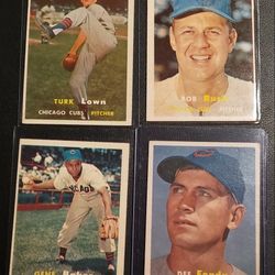 (4) 1957 Topps Baseball Cards. 