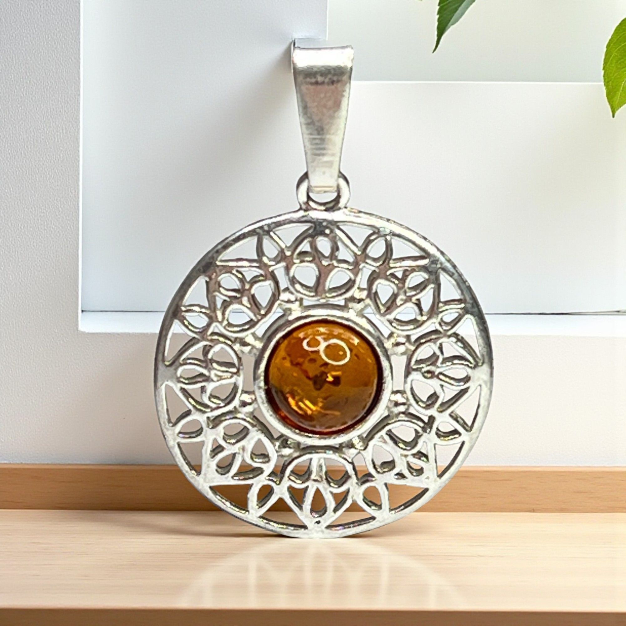 Amber & Sterling Silver Intricate Filigree Pendant With Circular Design