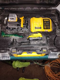 MAX Green Laser Level kit with a charger and battery