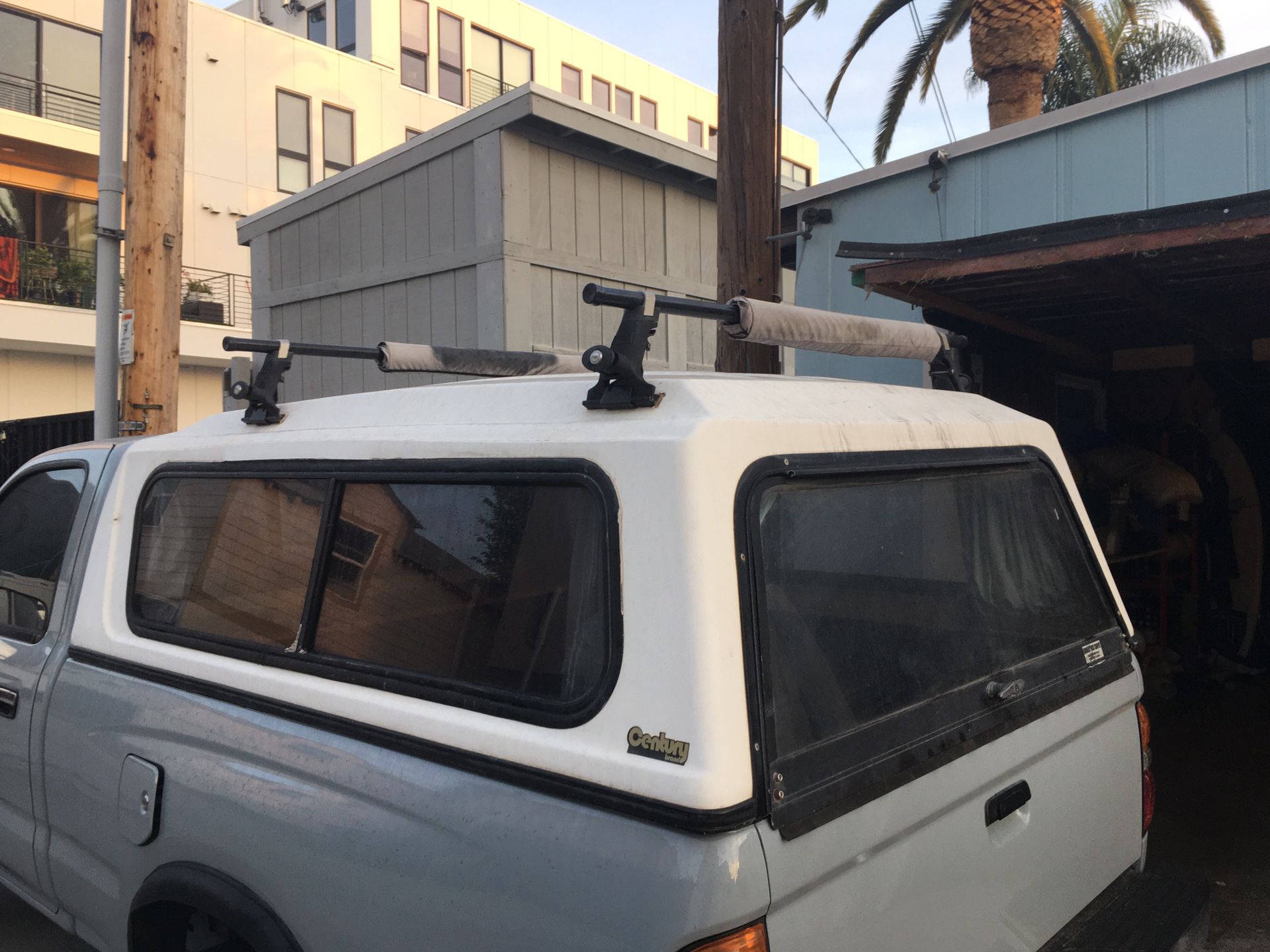 Tacoma Camper Shell with Thule Surf Racks