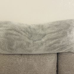 Grey long pillow approximately 4ft
