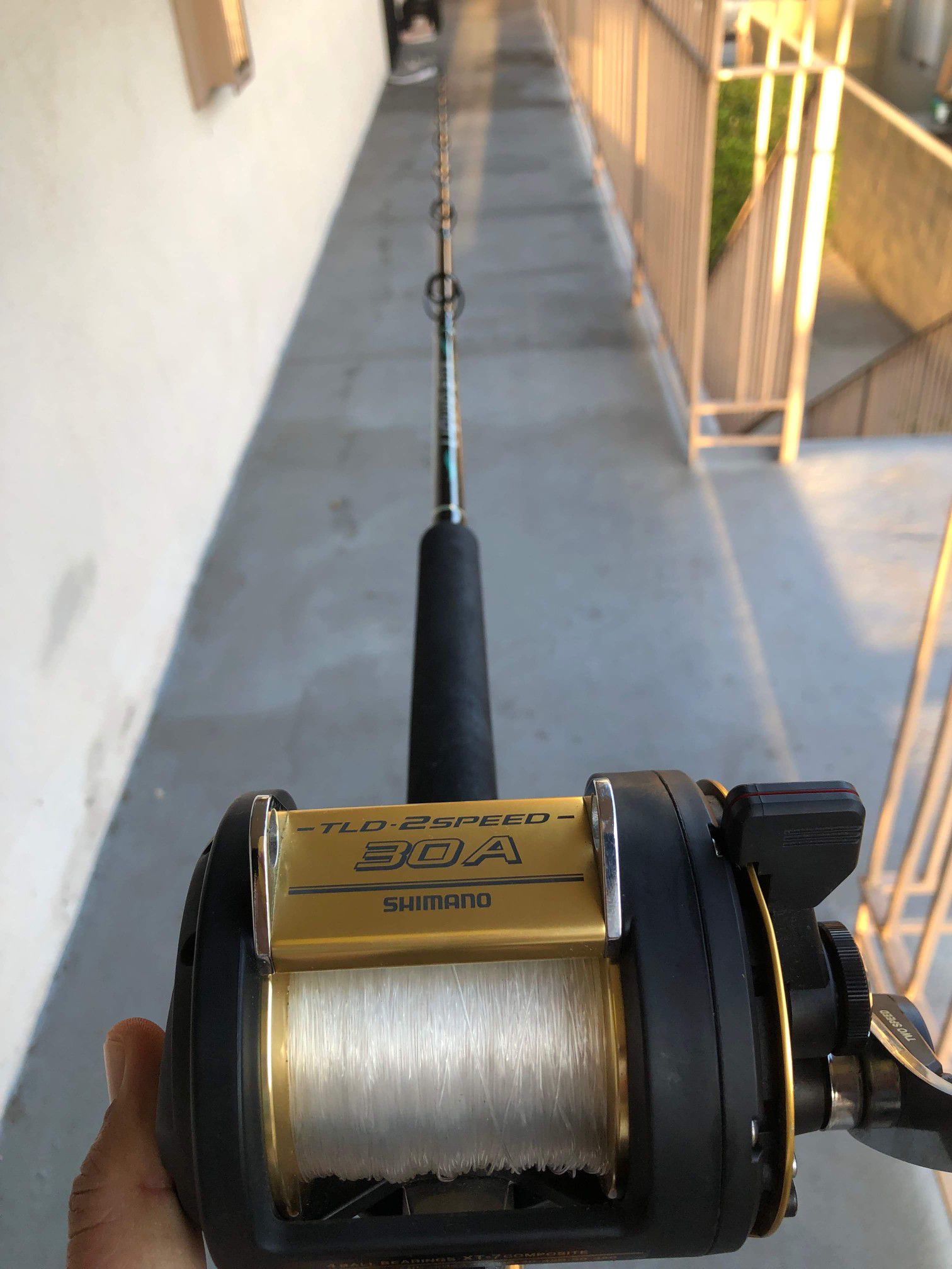 Shimano 2 speed fishing reel and fishing rod combo