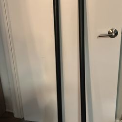 15 pound weighted bar and 18 pound weighted bar