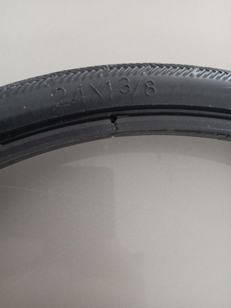 New 24x1-3/8" Solid Bike Tire.