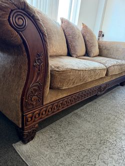 Ornate Wood-Carved Sofa with Velvet Upholstery