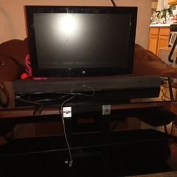 26in Tv, Sound Bar And Stand
