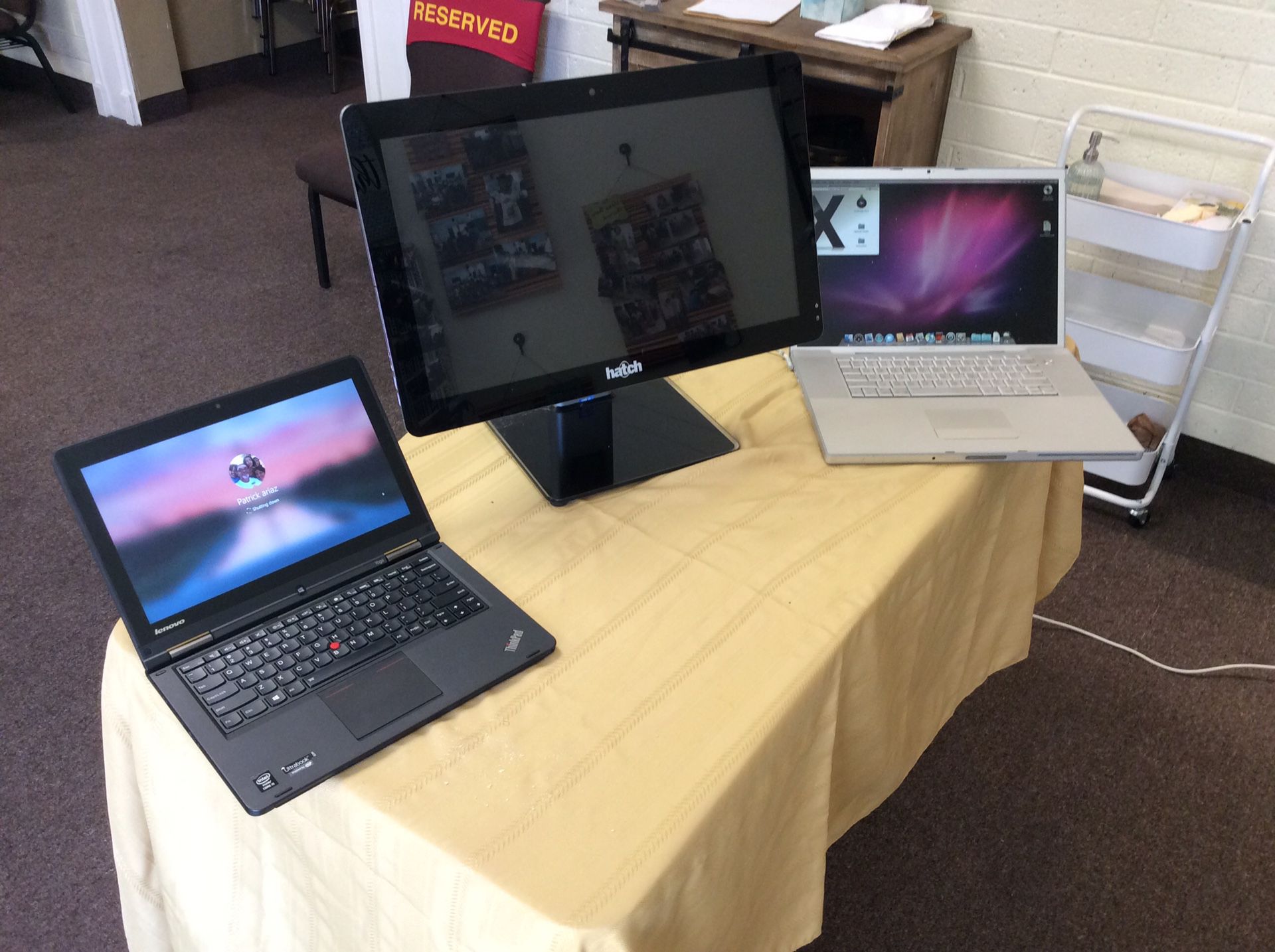 Trio of computers Mac Book pro and Lenovo laptop/Tablet and a all in one touch screen desktop computer selling as a group