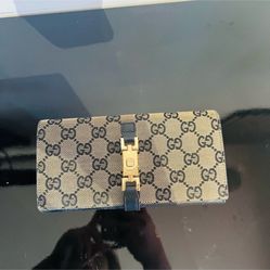 Authentic Gucci Black and Gold Women's Wallet