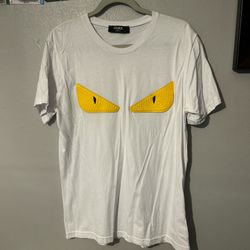 Medium Yellow Eyes Fendi tee for sale.
