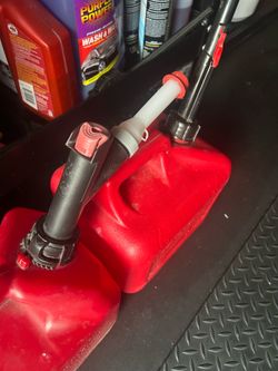 Two 2 gallon gas tanks