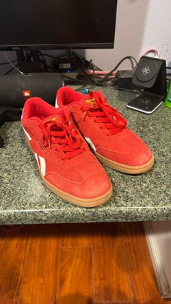 Red Reebok sneakers