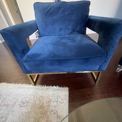 Blue velvet chair with golden legs