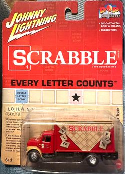 2022 Johnny Lightning Pop Culture Scrabble Every Letter Counts 1999 International Cargo Truck
