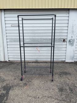 Rolling Metal Clothes Rack with  Shelves 50 OBO!