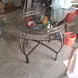 Bebbled glass table 47 inch across 29 inch tall