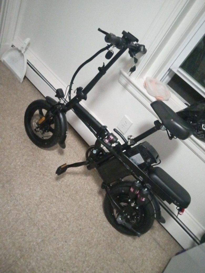 14 Inch Wheel Electric Bike. 20 Miles Per Hour