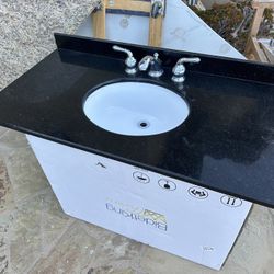 Black Granite Bathroom Countertop With Sink And Faucet