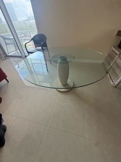 Dinning table: Italian marble and glass