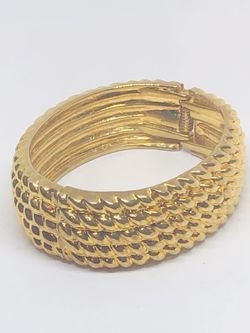 Gold tone bangle bracelet