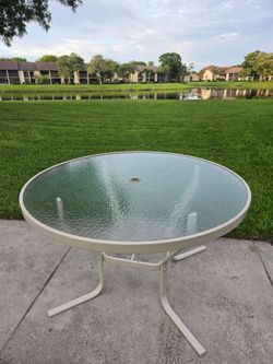 48" outdoor glass table with umbrella ring hole, pool, deck, patio.