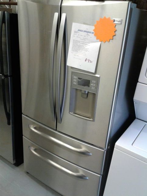 GE profile four doors French doors refrigerator excellent condition working perfectly