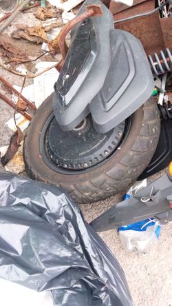 Electric motor and tire for scooter